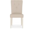 Ashley Antique White Uph Chair - Ivory Bonded Leather (Pair) Ashley Antique White Uph Chair - Ivory Bonded Leather (Pair)